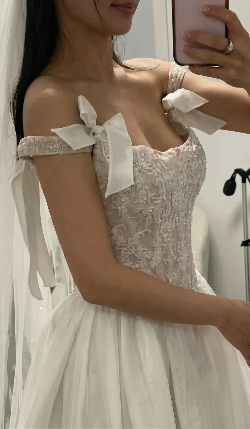 Off-shoulder gown with a loose neckline